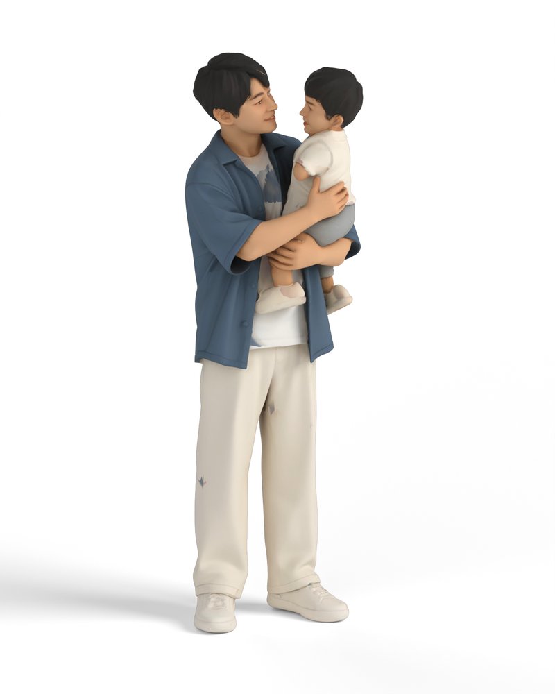 子どもを抱っこする父親