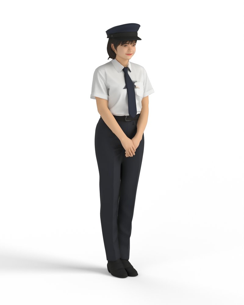 両手を前で組んで待機する女性駅員