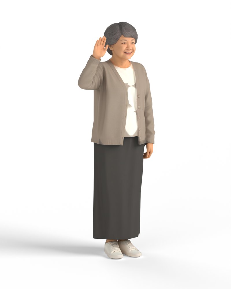 手を振って挨拶する年配の女性
